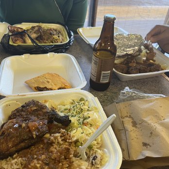 Caribbean Delights - Curry chicken plate, oxtail plate, and jerk chicken - Caribbean Near Me - Omaha, Nebraska