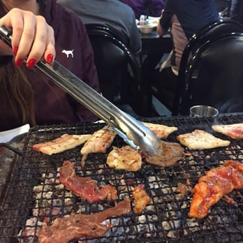 Gogi Time - That one meat on top that I forget what it's called, some kinda of beef on the bottom left, & spicy pork on the bottom right. - Korean Near Me - Oakland, California