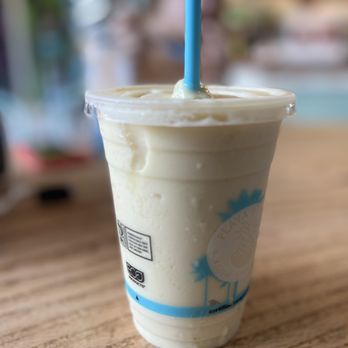 Playa Bowls - a drink in a plastic cup with a blue straw - Juice Bars & Smoothies Near Me - Peachtree Corners, Georgia