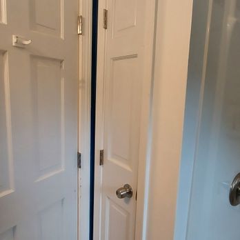 TC Construction & Home Improvement - July 2021 before picture of existing closet door in bathroom. - General Contractors Near Me