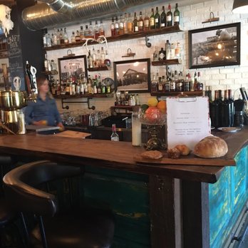Chartier - Their bar nicely stocked - French Near Me - Beaumont, Alberta