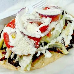Nana's Ollas - Vegetarian memela with seasoned black beans and potatoes a la mexicana