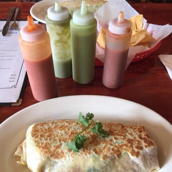 Los Cazadores - a plate of food and condiments - Mexican Near Me - Carbondale, Colorado Los Cazadores - a plate of food and condiments - Mexican Near Me - Carbondale, Colorado