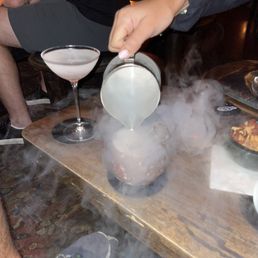 This is a drink my date ordered - can't remember what it was called but it came with olives and was very dry like a martini!