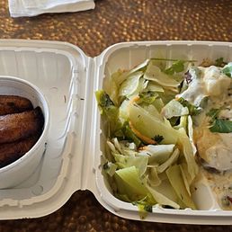 Jerk salmon, rice, cabbage, and plantains Jerk salmon, rice, cabbage, and plantains