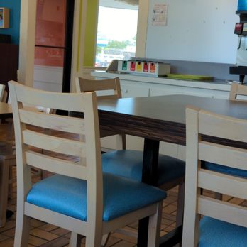 Captain D's - a table and chairs in a restaurant - Seafood Near Me - Thomasville, Georgia Captain D's - a table and chairs in a restaurant - Seafood Near Me - Thomasville, Georgia