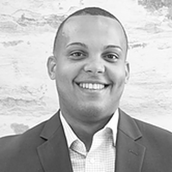 EDR Construction & Management - a black and white photo of a smiling man - General Contractors Near Me - Brooklyn, New York