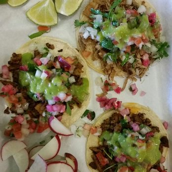 Tortacos - Top to bottom: carnitas taco, 2 al pastor tacos -- all with cilantro, onions, pico de gallo, green salsa, pickled onions - Mexican Near Me - Germantown, Maryland Tortacos - Top to bottom: carnitas taco, 2 al pastor tacos -- all with cilantro, onions, pico de gallo, green salsa, pickled onions - Mexican Near Me - Germantown, Maryland