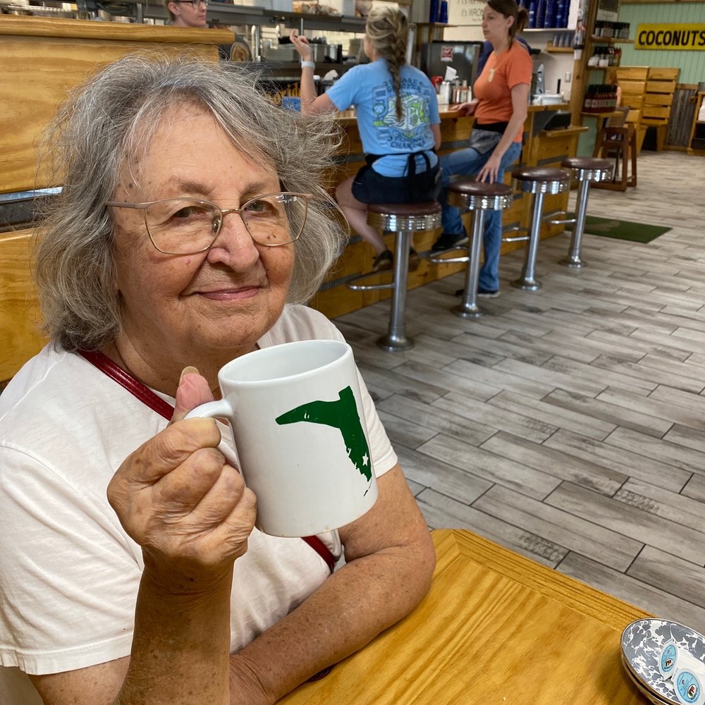Mom enjoying a cup of Joe at Florida Cracker Kitchen Mom enjoying a cup of Joe at Florida Cracker Kitchen