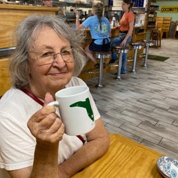 Mom enjoying a cup of Joe at Florida Cracker Kitchen Mom enjoying a cup of Joe at Florida Cracker Kitchen