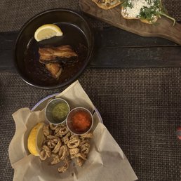 Crispy Calamari, Pork Belly Pincho, Corn Tostada, and Arugula Tostada Crispy Calamari, Pork Belly Pincho, Corn Tostada, and Arugula Tostada