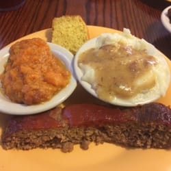 MEs Place - Meatloaf, mashed potatoes & sweet potatoes with a side of corn bread.