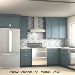 Creative Solutions - Blue cabinetry with warm Wood floor and shelving is clean and comfortable.