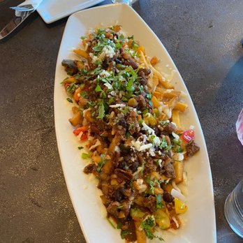 Whitefish Handcrafted Spirits - Loaded fries - Desserts Near Me - Kalispell, Montana Whitefish Handcrafted Spirits - Loaded fries - Desserts Near Me - Kalispell, Montana