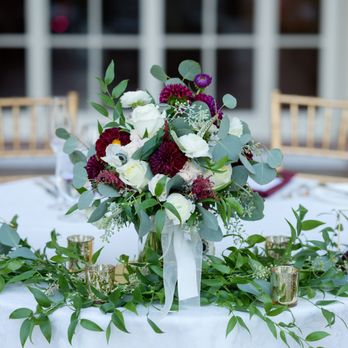 Sweet Peas Floral Designs - Bridal Bouquet used as centerpiece for sweetheart table - Floral Designers Near Me
