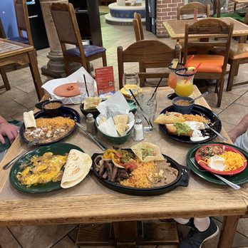 Mamacita's Restaurant - Entire table full of various dishes. - Mexican Near Me - Kerrville, Texas Mamacita's Restaurant - Entire table full of various dishes. - Mexican Near Me - Kerrville, Texas