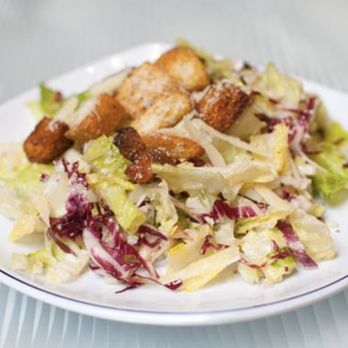 Founders Cafe - a white plate with a salad on it - Sandwiches Near Me - Rochester, New York