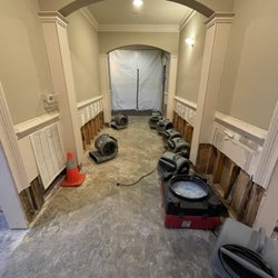 Emergency Restoration Solutions - Flooded lobby caused by category 3 water loss on the 4th floor of condominium.