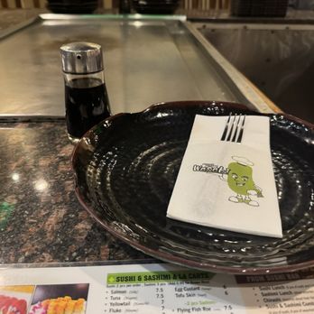 Wasabi Steak House - Plate setting. Note the level of soy sauce at the start of dinner. - Japanese Near Me - Salem, New Hampshire