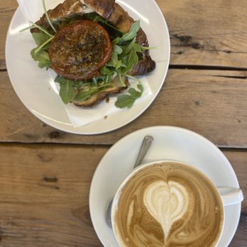 Sihana Café - Almond milk flats white and tomato croissant - Coffee & Tea Near Me - Newark, New Jersey Sihana Café - Almond milk flats white and tomato croissant - Coffee & Tea Near Me - Newark, New Jersey