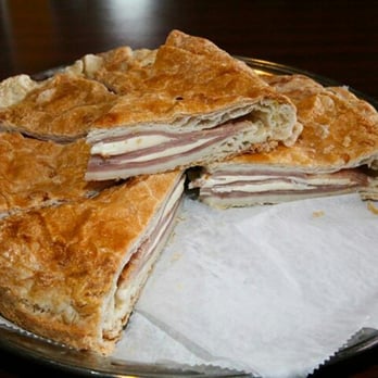 La Rou Uruguayan Bakery - a cut in half sandwich on a plate - Bakeries Near Me - Elizabeth, New Jersey