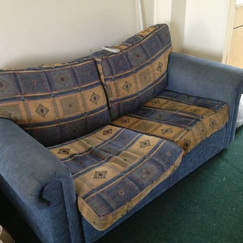 John Fowler Holiday Park - Disgusting couch with poo or blood stains on the mattress that is rolled up inside the fold out bed - Vacation Rentals Near Me - Ilfracombe, DEV