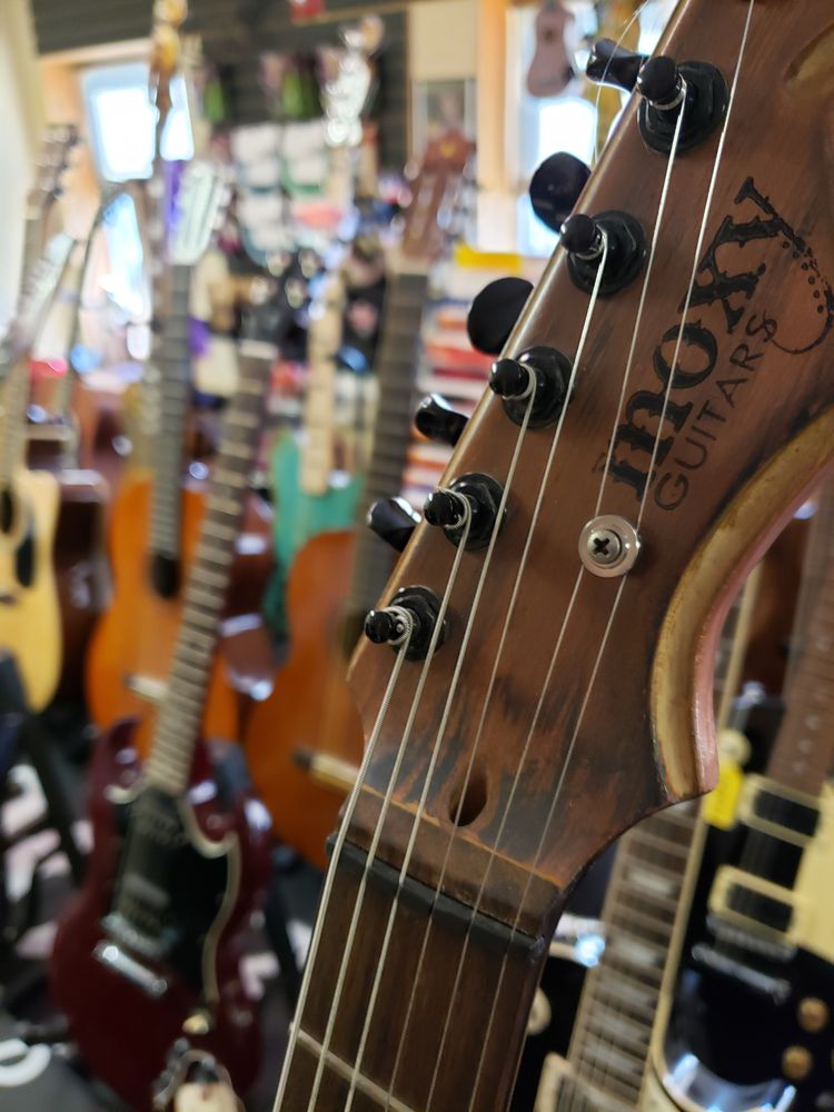 Flemington Guitar Shop Logo