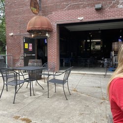 Some outdoor seating in the back, looking in