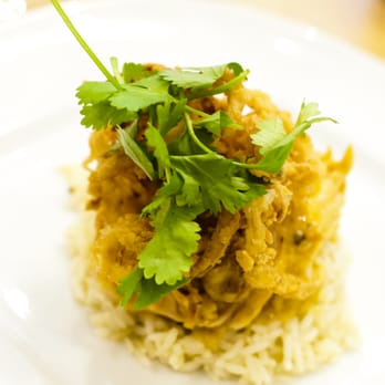 Hilton Garden Inn Jackson Downtown - Roasted Turkey Breast in Coconut and Curry Sauce over Spiced Rice - Hotels Near Me - Jackson, Mississippi
