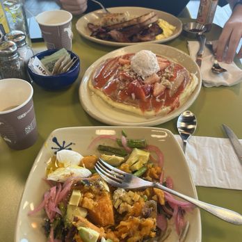 Snooze, an A.M. Eatery - Sweet Potato Veggie Smash up, Strawberry Shortcake Pancake, and the Snooze Classic with scrambled eggs and bacon. - Breakfast & Brunch Near Me - Kyle, Texas Snooze, an A.M. Eatery - Sweet Potato Veggie Smash up, Strawberry Shortcake Pancake, and the Snooze Classic with scrambled eggs and bacon. - Breakfast & Brunch Near Me - Kyle, Texas