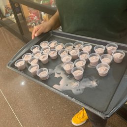 Cherry ice cream samples, being offered outside the store. Cherry ice cream samples, being offered outside the store.