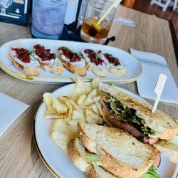 Wonderland Distilling - Fried Bologna Sandwich and Cherry Pepper Jam and Goat Cheese Crostini yummy