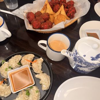The indian Bistro - Sampler platter and Chicken Momo - Indian Near Me - Arcade, New York The indian Bistro - Sampler platter and Chicken Momo - Indian Near Me - Arcade, New York