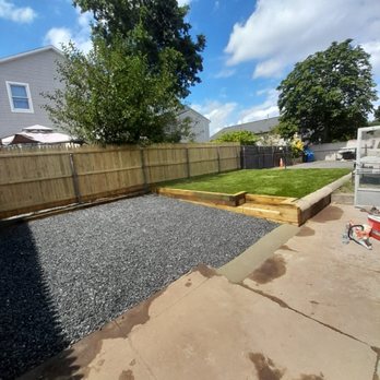 Nelson Landscaping - Retaining wall and fence and stone parking lot done in providence RI - Landscaping Near Me