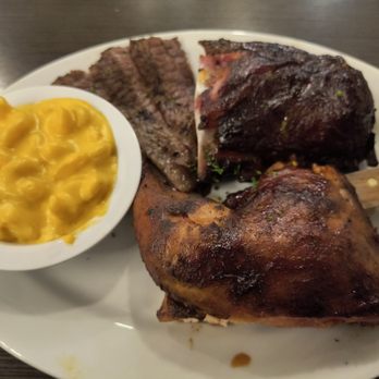 Emerald Island Grill - Three meat combo. Brisket, ribs, chicken with Mac n cheese - American Near Me - Henderson, Nevada