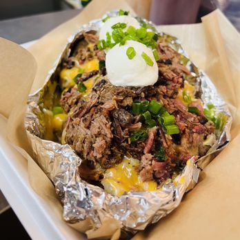 Ain't She Grand BBQ Co. Logo