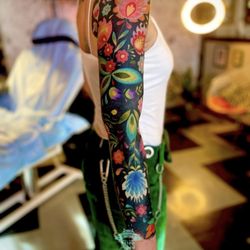 Miss Kitty Tattoo - A completed sleeve made by Miss Kitty.