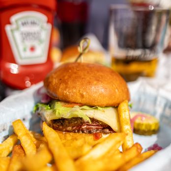 The Furbish House Brewhouse & Eats - Bacon Onion Jam Bison Burger ($16.50) comes w/ Furbish Fries & a Pickle - Pizza Near Me - Rangeley, Maine The Furbish House Brewhouse & Eats - Bacon Onion Jam Bison Burger ($16.50) comes w/ Furbish Fries & a Pickle - Pizza Near Me - Rangeley, Maine