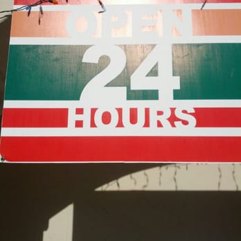 7-Eleven - a sign for 24 hours - Convenience Stores Near Me - Atascadero, California