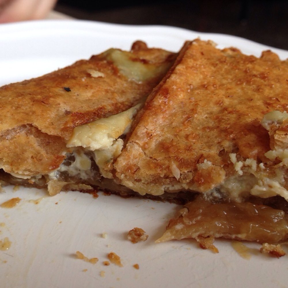 Bagel Miller - Caramelized onion blue cheese hand pie close up, heavenly. - Comfort Food Near Me - Chicago, Illinois Bagel Miller - Caramelized onion blue cheese hand pie close up, heavenly. - Comfort Food Near Me - Chicago, Illinois
