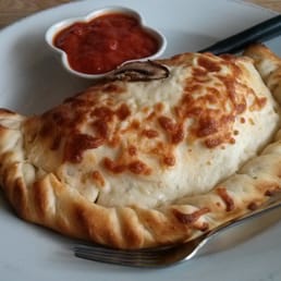Canadian Panzarotti $9. Hugh in portion.  See fork as size reference