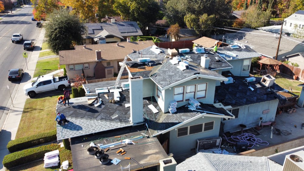 Slide of JAG Roofing