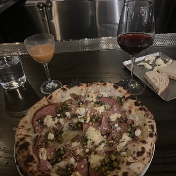 Culaccino - IL RE DI BOLOGNA pizza. mortadella, ricotta, pistachio pesto, garlic chips - Italian Near Me - Franklin, Tennessee