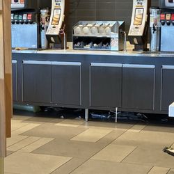 McDonald's - Garbage swept under the drink counter