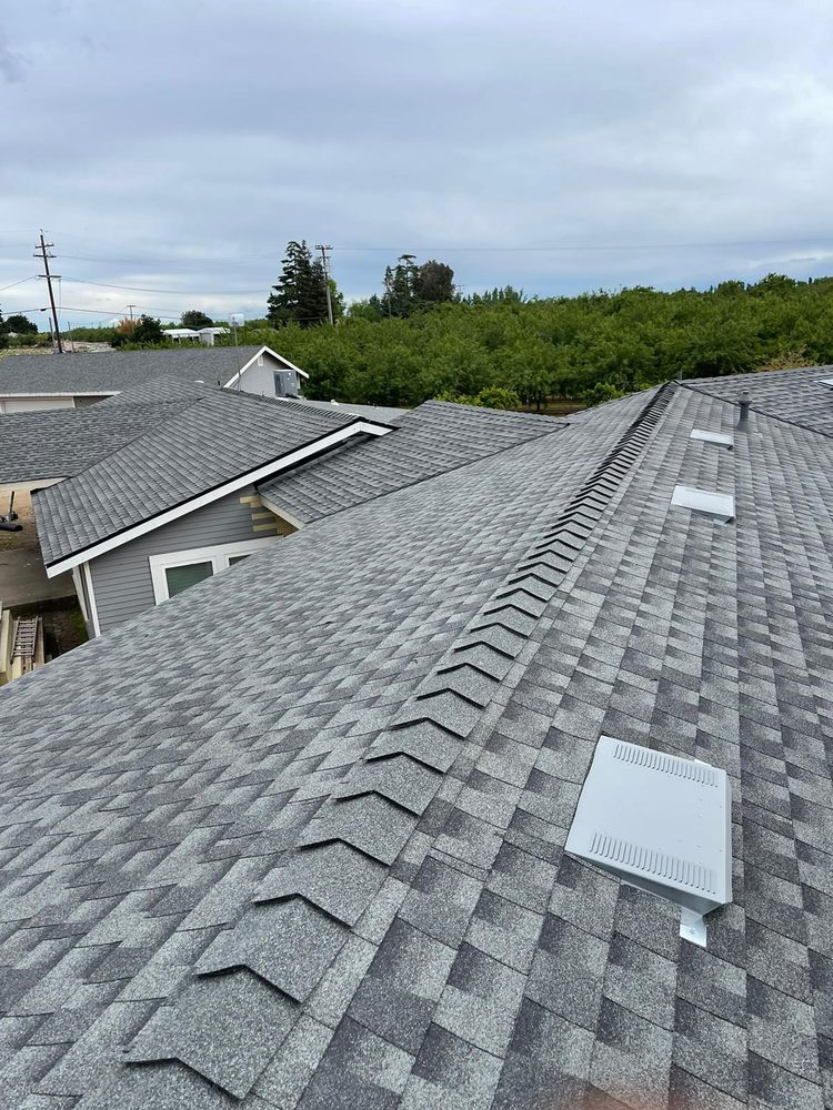 Slide of Art’s Roofing