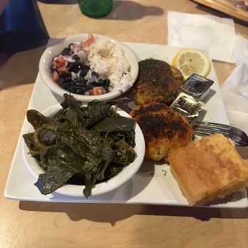 Sam & Omie's Restaurant - Crab Cakes with Collards, black beans and rice, and cornbread - American Near Me - Nags Head, North Carolina Sam & Omie's Restaurant - Crab Cakes with Collards, black beans and rice, and cornbread - American Near Me - Nags Head, North Carolina