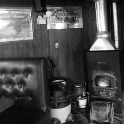 H & H Bar - Pellet stove and classic Budweiser swag.