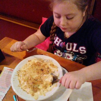The Other Place Pub - My 8yr old enjoying the white chedder mac&cheese.huge helping,delicious, great service as usual.You cant go wrong at The Other Place Pub. - Pubs Near Me - Boylston, Massachusetts