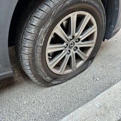 Almond Street Garage - Hole in sidewall. They gave me the # for a local tow and took care of my car!