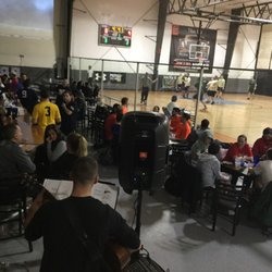 Insports Game on Bar & Grill - Lower Bar - Open Space with 20 foot screen TV, cornhole boards & viewing to both basketball courts and soccer field